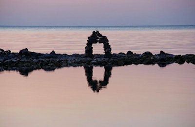 photo of balanced rocks on shoreline