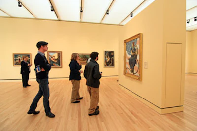 The museum includes famous works of American art like Andy Warhol's 'Dolly Parton' and Norman Rockwell's 'Rosie the Riveter' (pictured).
