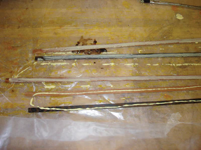 Campbell started with 1/16-inch-thick strips of maple, santos mahogany and wenge.