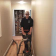 Gary sanding wood floor.jpg