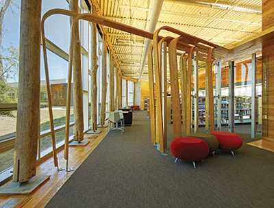 The wood is bent and curved on the floor and ceiling (above) and into a display of 'raining wood' near the ash structural beams.