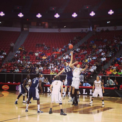 University of Wyoming and University of Nevada, Reno tip off in the first round of the Mountain West Conference NCAA Tournament. Photo courtesy of Mountain West.