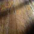 Filler pushed up in wood floor.jpg