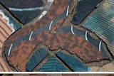 These intricate inlays of a sea serpent and wave-tossed ship accent Meadows' end-grain floor.