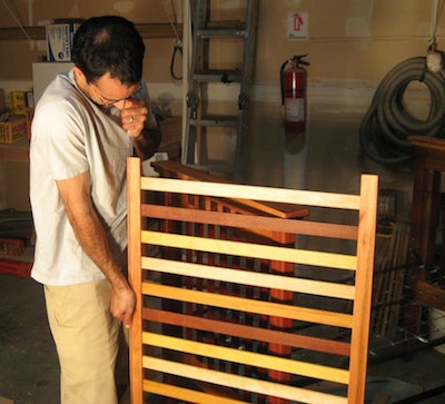 Here I am installing the hardware on a crib I made for my kids that has grapa gold, yellowheart, bubinga and bloodwood.