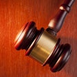 photo of a gavel on wood