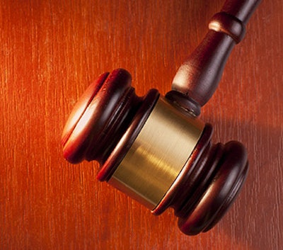 photo of a gavel on wood