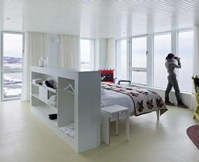 Some of the wood floor in the guest rooms are painted, a common practice in Fogo Island homes.