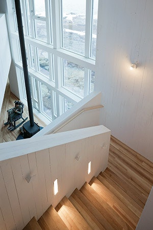 The architects chose yellow birch for common areas because it was the hardest locally available wood. (Photos by Iwan Baant)