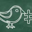 photo of a chalkboard drawing of a bird next to a hashtag