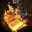 photo of a laptop on fire