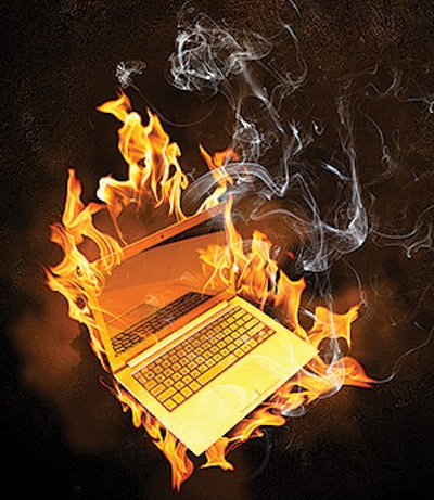 photo of a laptop on fire