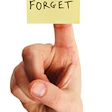 photo of a hand with a post-it note on the finger