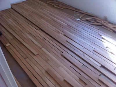 Avi Hadad Racking A Wood Floor