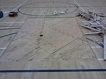 photo of a gym floor repair job