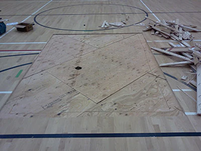 photo of a gym floor repair job