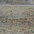 Experimenting showed that spots like this only appeared on the floor when metal shavings were worked into the open grain of freshly sanded wood and coated with waterborne finish.
