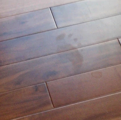 The customer told me that smudges like this footprint were exactly what she hated about her '*$#^$ wood floor.'
