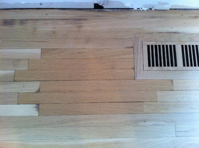 Roy Reichow - badly laced in wood flooring in a wood floor repair