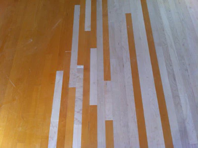 Roy Reichow - correctly laced in wood flooring in a wood floor repair