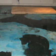 This photo shows calcium chloride tests tests being done AFTER we sealed the concrete. Why? Because that was the first job I did using that epoxy sealer, so I tested before and after we sealed the slab. The reading before the epoxy was 3.8 lb.; after sealing the slab the reading was 0.4 lb.