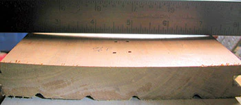 photo of wood flooring showing what added moisture does to it