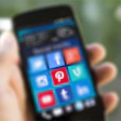 photo of a phone showing a Pinterest logo