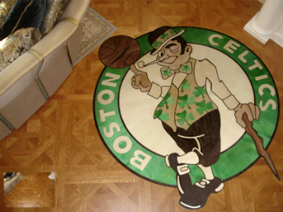 Best Extreme Makeover: Czar Floors This Boston Celtics medallion was placed in a client's 'man cave,' and uses maple, walnut and ash, along with a custom green stain.
