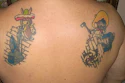 Manny Navarro shows off the wood flooring tattoos on his back.