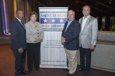 Don Finkell and Wayne Cotton, at right, pose with guests. Photo: David Stluka Photography