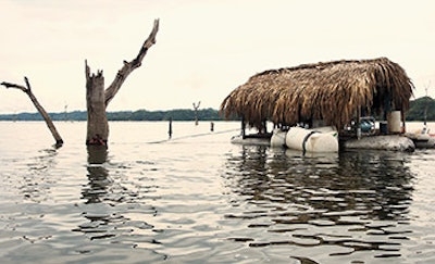 CoastEcoTimber collects wood using barges that float on recycled propane tanks.