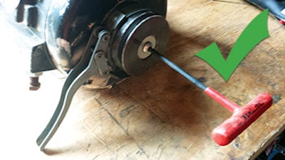 photo of automotive oil filter wrench repair approach