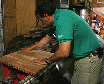 Alan sands a Brazilian cherry panel