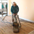 Paul Sullivan, Alan’s 78-year-old father, prefers drum sanders. Here he sands years’ worth of grime off the Donoho Hotel floors with an American Super 83.