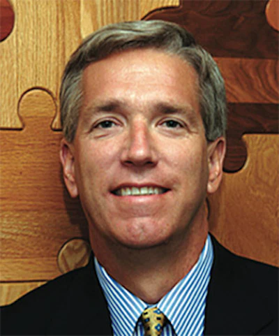 Neil Poland, Mullican Flooring, becomes chairman.