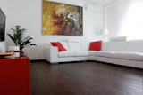 This 6-inch plank floor is a thermally modified ash floor glued direct to concrete with radiant heat in Milan, Italy, and has a rubbed oil finish. (Photo courtesy of Thermory USA)
