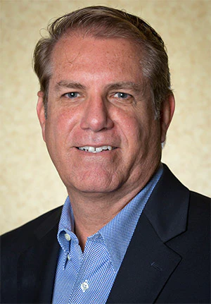 Wayne Cotton, Design Flooring Distributors, becomes president.