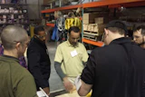 Avi Hadad, the owner of Avi's Hardwood Floors, leads a Master Craftsman school at NWFA headquarters last week.