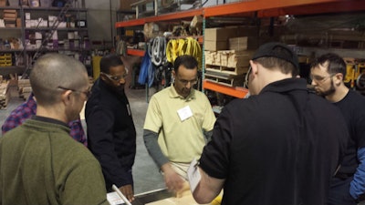 Avi Hadad, the owner of Avi's Hardwood Floors, leads a Master Craftsman school at NWFA headquarters last week.