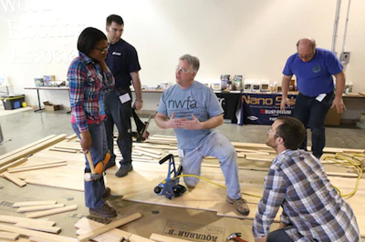 Todd McDonald of Glitsa, a division of Rudd Company, teaches wood floor fastening technique at the National Wood Flooring Association (NWFA) Principles of Wood Flooring training course in March 2015.