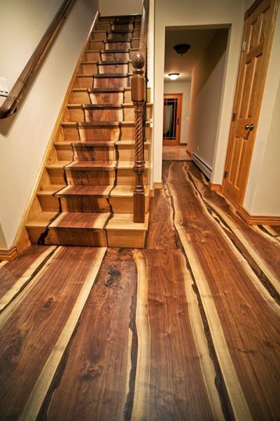 Real Antique Wood's black walnut, live-edge stairs and floor project went viral on the company's Facebook page. Photo: Chris Saraceno