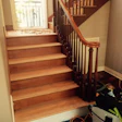 Scraping the cherry stair treads.