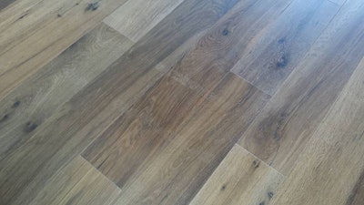 6 22 15 Tape Damage Wood Floor 1