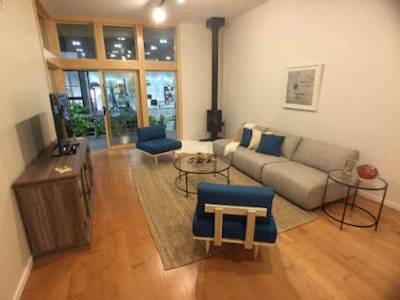 One version of the homes that will be built on the Fort Peck Reservation was displayed at Dwell on Design in May. The homes feature Shaw’s Epic engineered hardwood in the Meridian style.