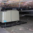 A dehumidifer in a crawl space.