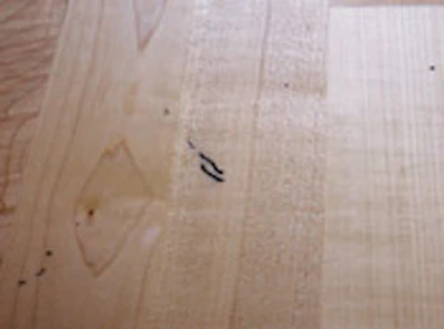 It's Likely That These Marks From A Sharpie Marker Have Penetrated Most Of The Finish And Won't Come Out With A Recoat