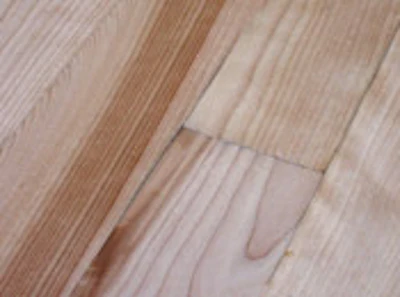 Moisture Damage, Such As These Black Lines At Board Edges From A Leaking Christmas Tree Stand, Will Still Be Visible After Recoating