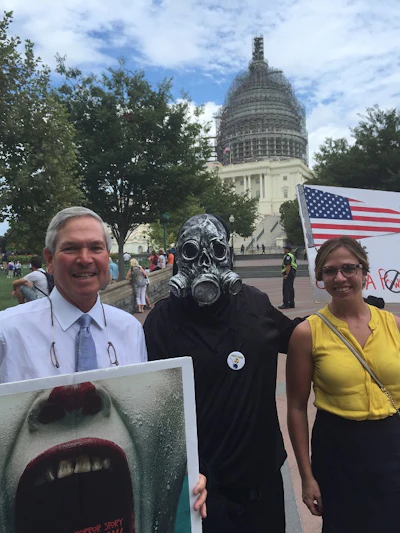 Skipper Beal, an Iran rally attendee and Allie Finkell