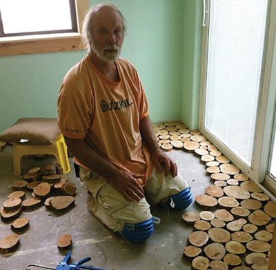 Tony Lutz went through 48 tubes of adhesive to install a juniper cordwood floor in his family's home.