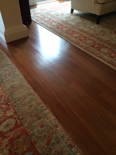 A bad Brazilian cherry refinish job that had been done by another company.